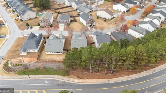 a view of a lake with a yard