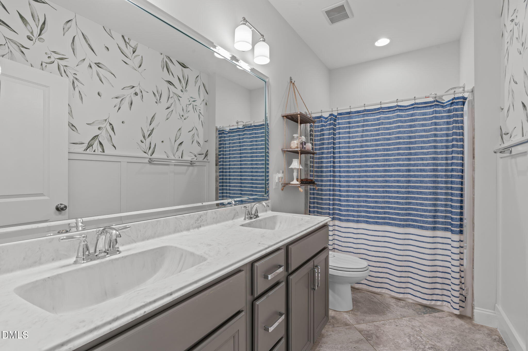 4144 Olde Judd Drive Willow Spring, NC 27592 - Photo 31 of 52 a bathroom with a sink vanity and a mirror