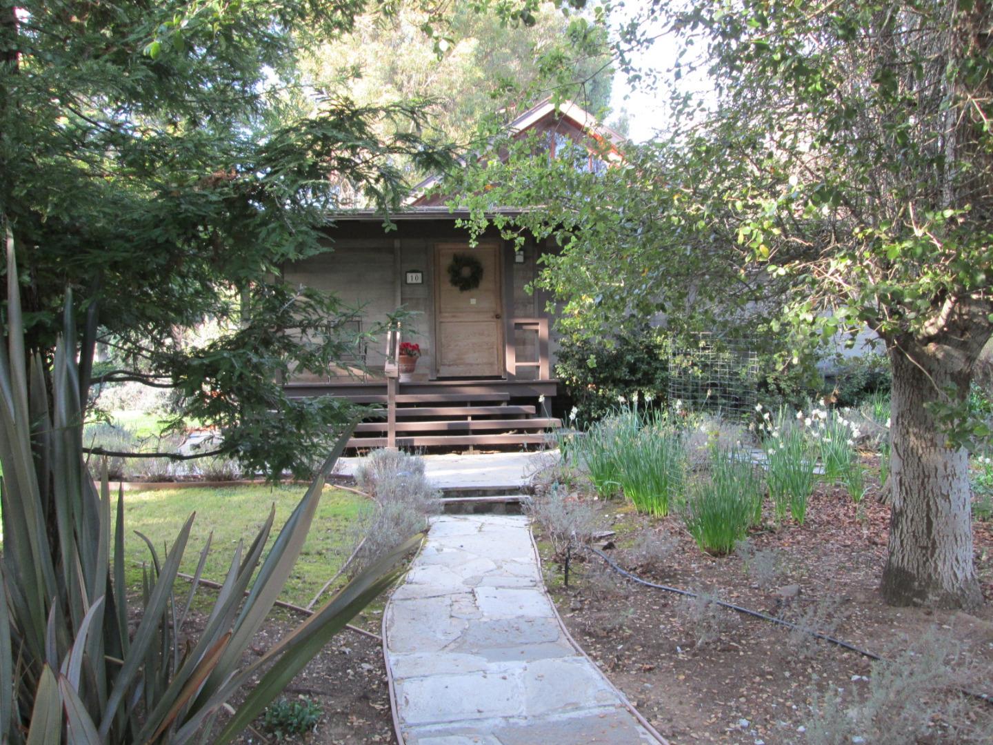 10 Palm Circle Road Woodside, CA 94062 - Photo 1 of 12 a front view of a house with a yard