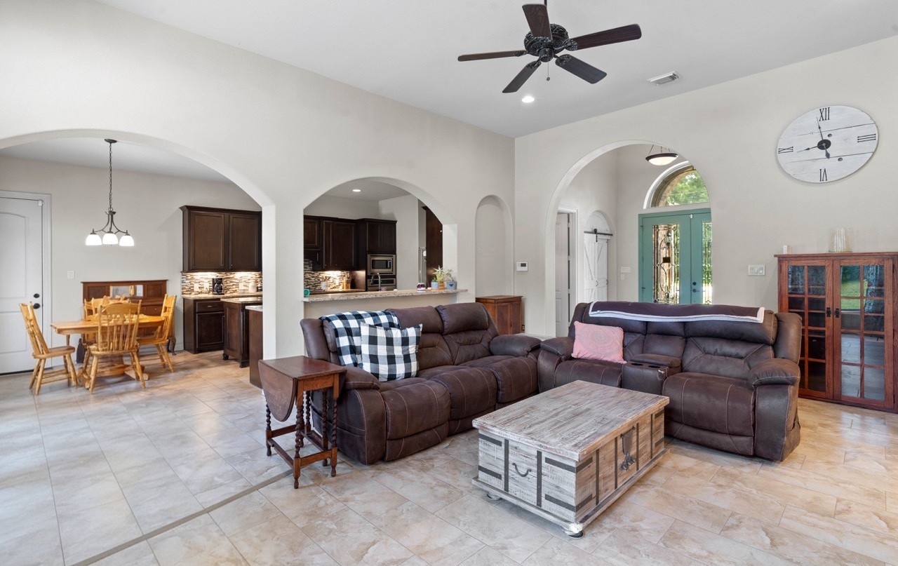 27585 Rio Blanco Drive Splendora, TX 77372 - Photo 10 of 39 Open concept living making entertaining a breeze! Imagine family and friends gathered around during those special days and moments.