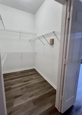 a view of a room with racks on the wall