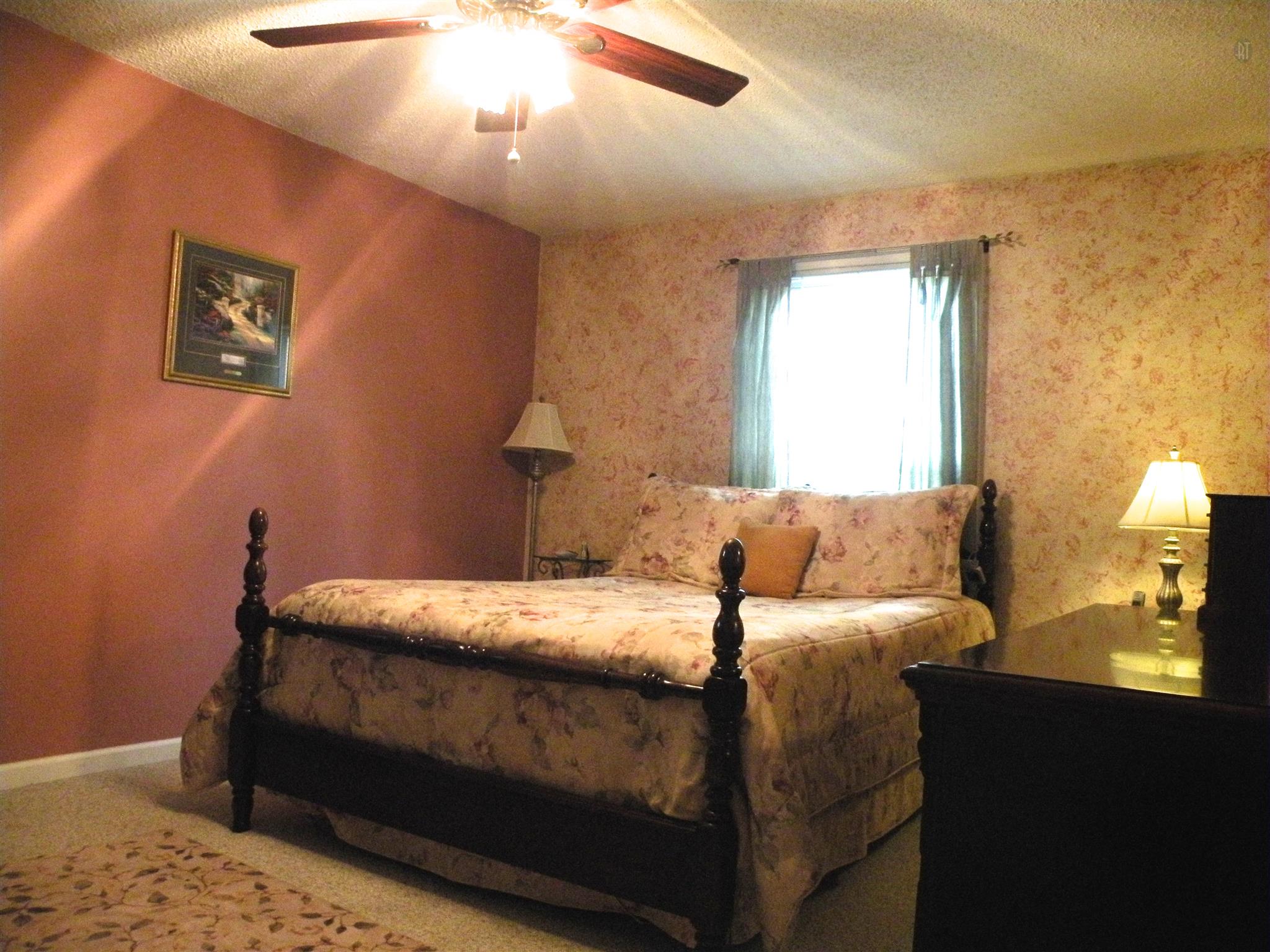 304 Haynes Road Portland, TN 37148 - Photo 16 of 21 a bedroom with a bed and window