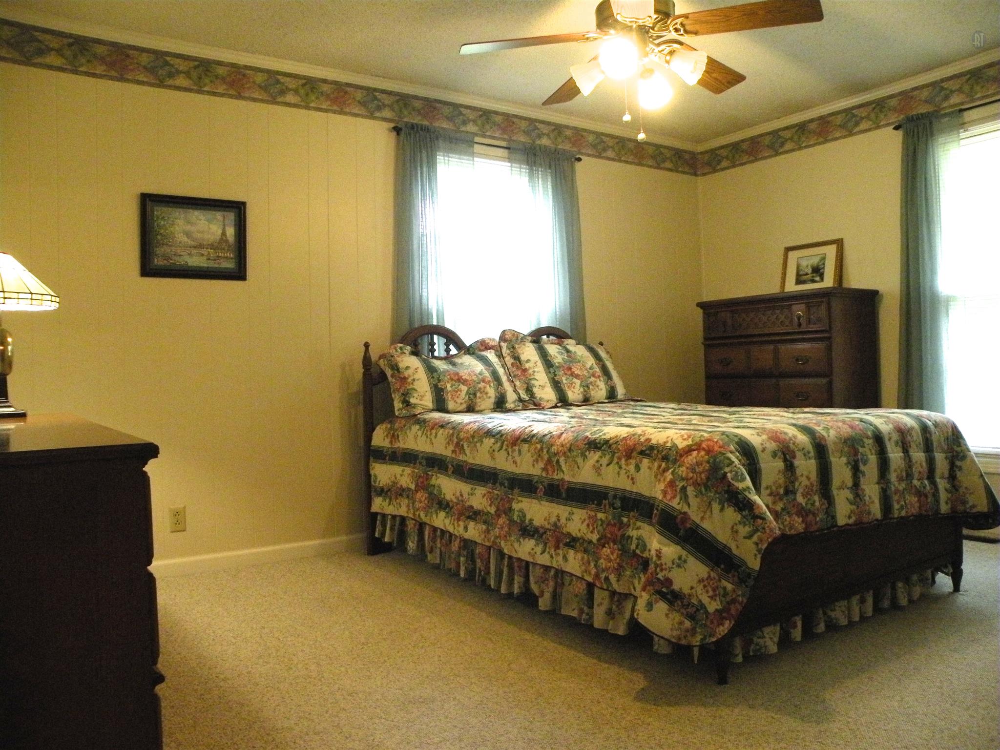 304 Haynes Road Portland, TN 37148 - Photo 17 of 21 a bedroom with a bed and dresser