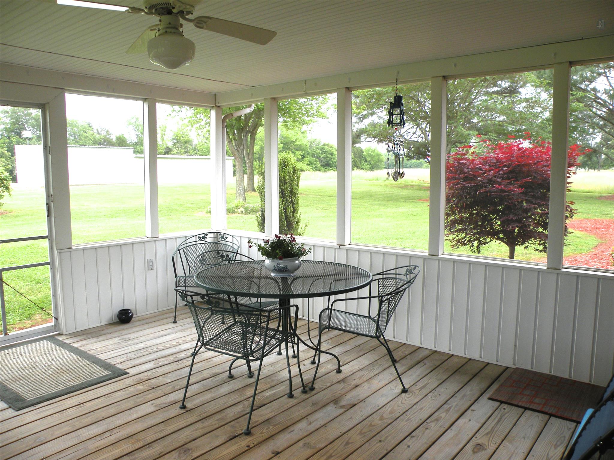 304 Haynes Road Portland, TN 37148 - Photo 4 of 21 a view of a dining room with furniture and wooden floor