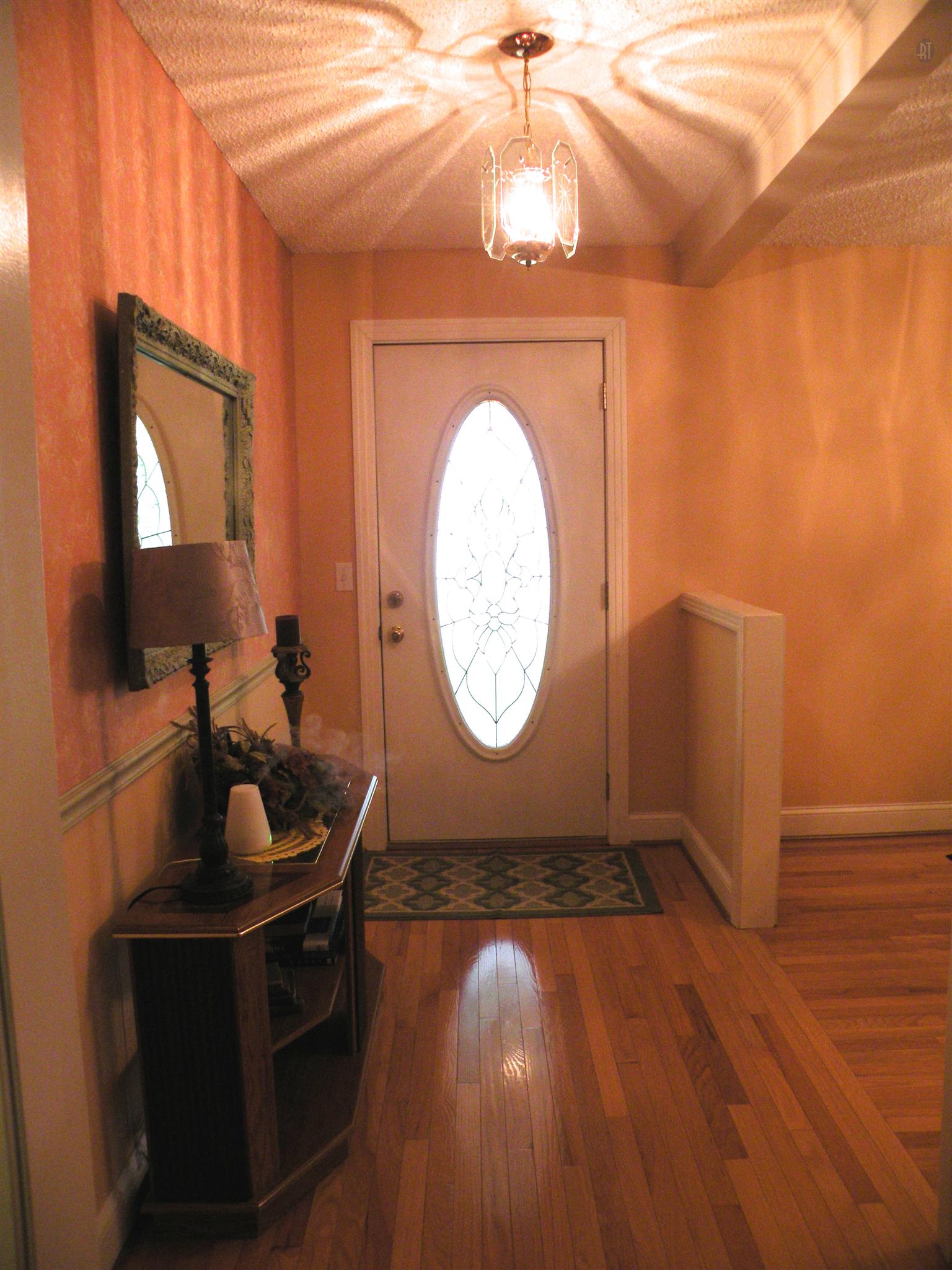 304 Haynes Road Portland, TN 37148 - Photo 9 of 21 a room with a mirror and wooden floor