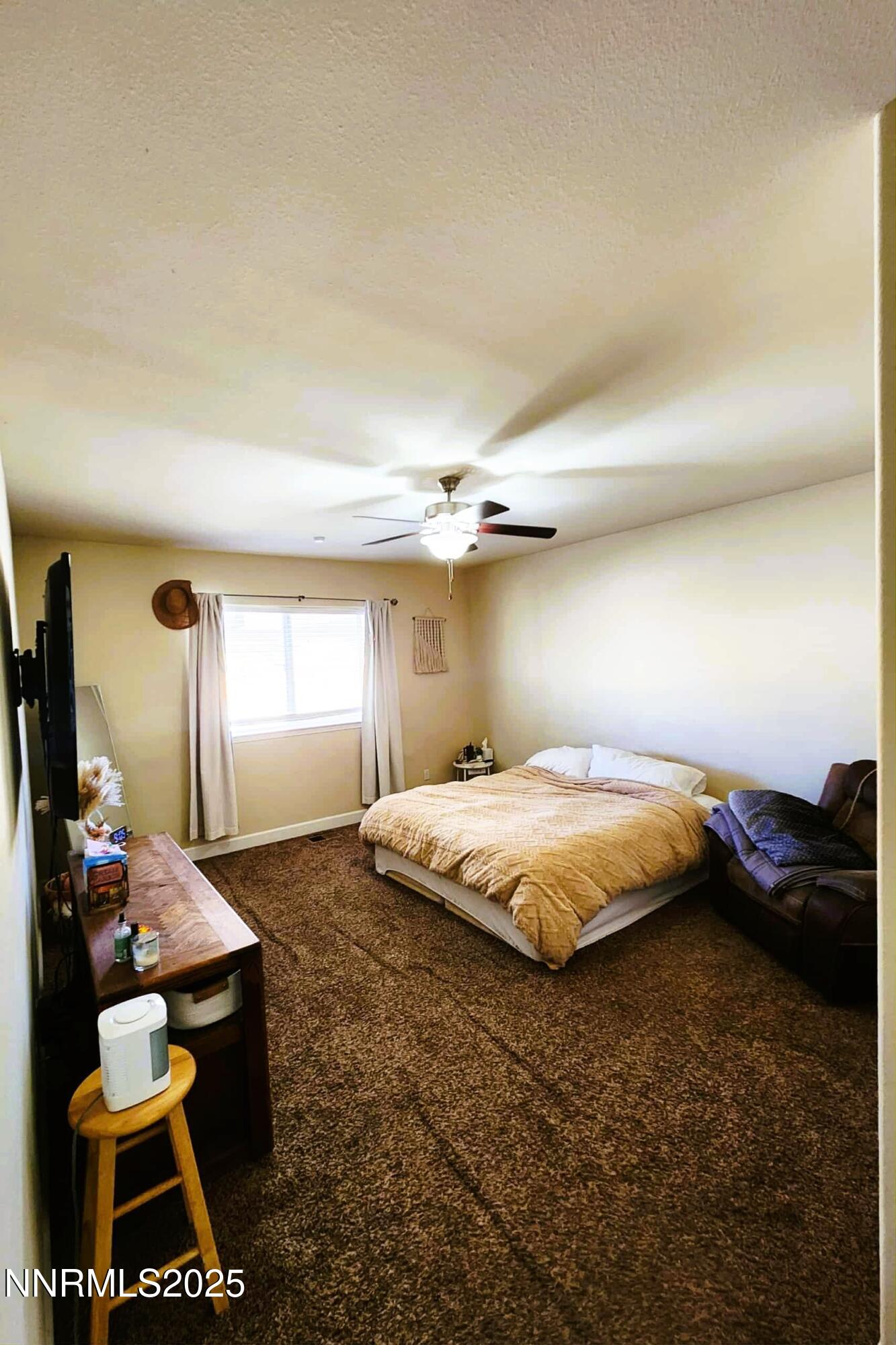 203 Verre Court Dayton, NV 89403 - Photo 18 of 28 a bedroom with a bed and window