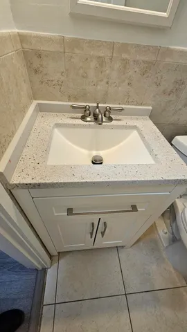 a close view of sink and stove