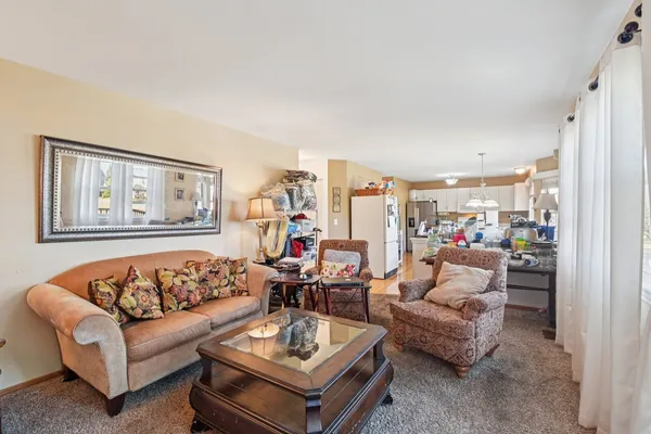 a living room with furniture and a couch