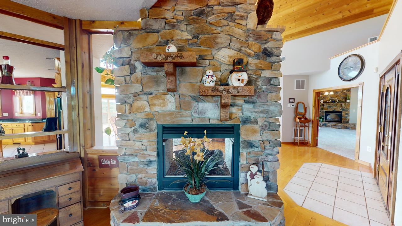 2810 Don McCauley Road Romney, WV 26757 - Photo 14 of 94 See thru fire place
