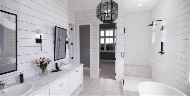 a bathroom with a granite countertop sink a toilet and shower