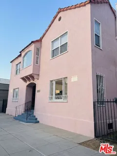 a front view of a house with garage