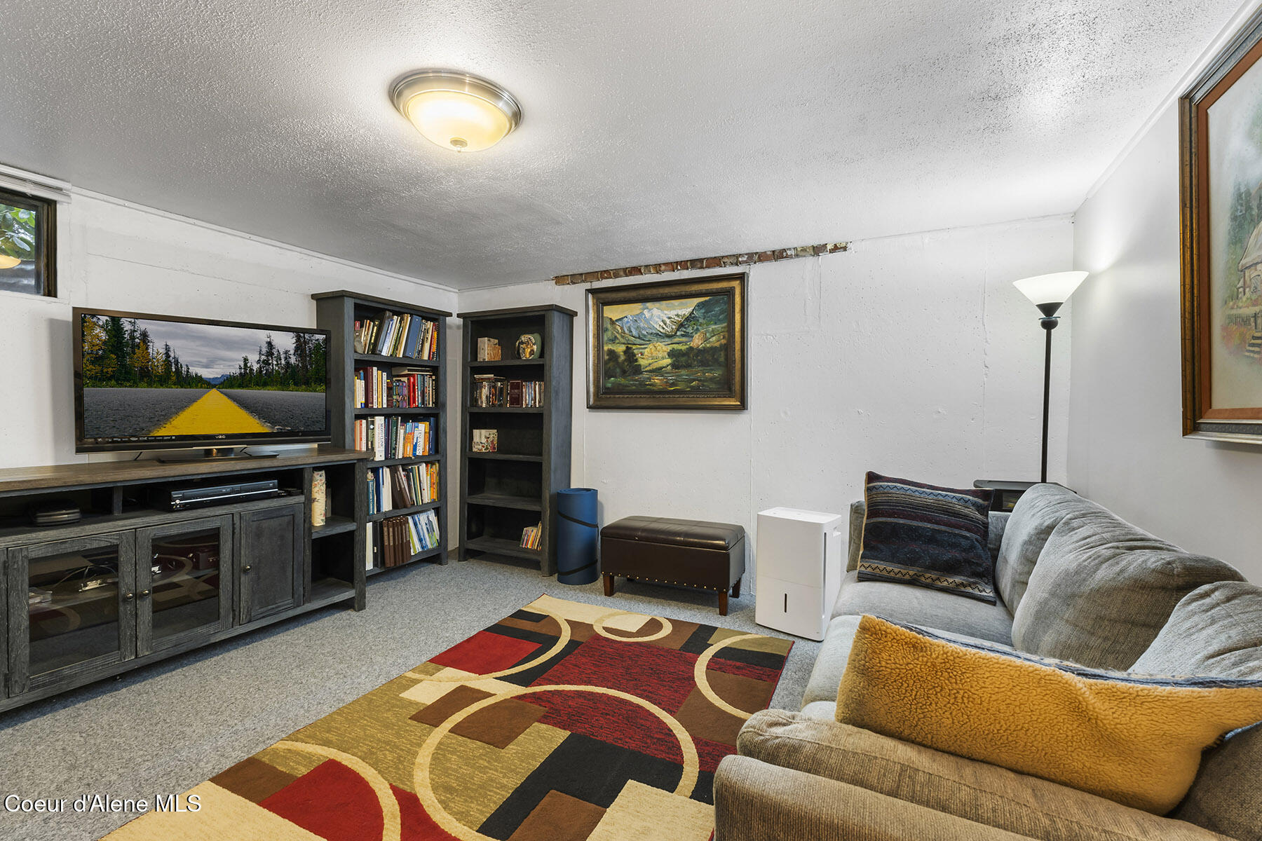 9490 North Atlas Road Hayden, ID 83835 - Photo 21 of 39 Cozy Lower Level Living Space