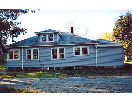 475 Rounseville Road Rochester, MA 02770 - Photo 2 of 5 a view front of house with a yard