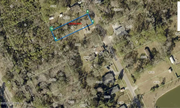 a street sign that is on a tree