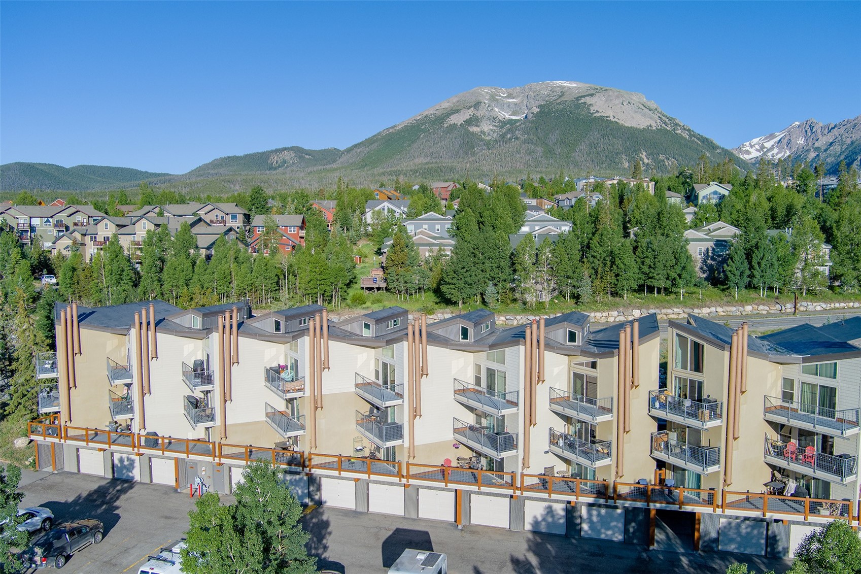 7031 Ryan Gulch Road, Unit 301 Silverthorne, CO 80498 - Photo 2 of 37 a view of city with tall buildings