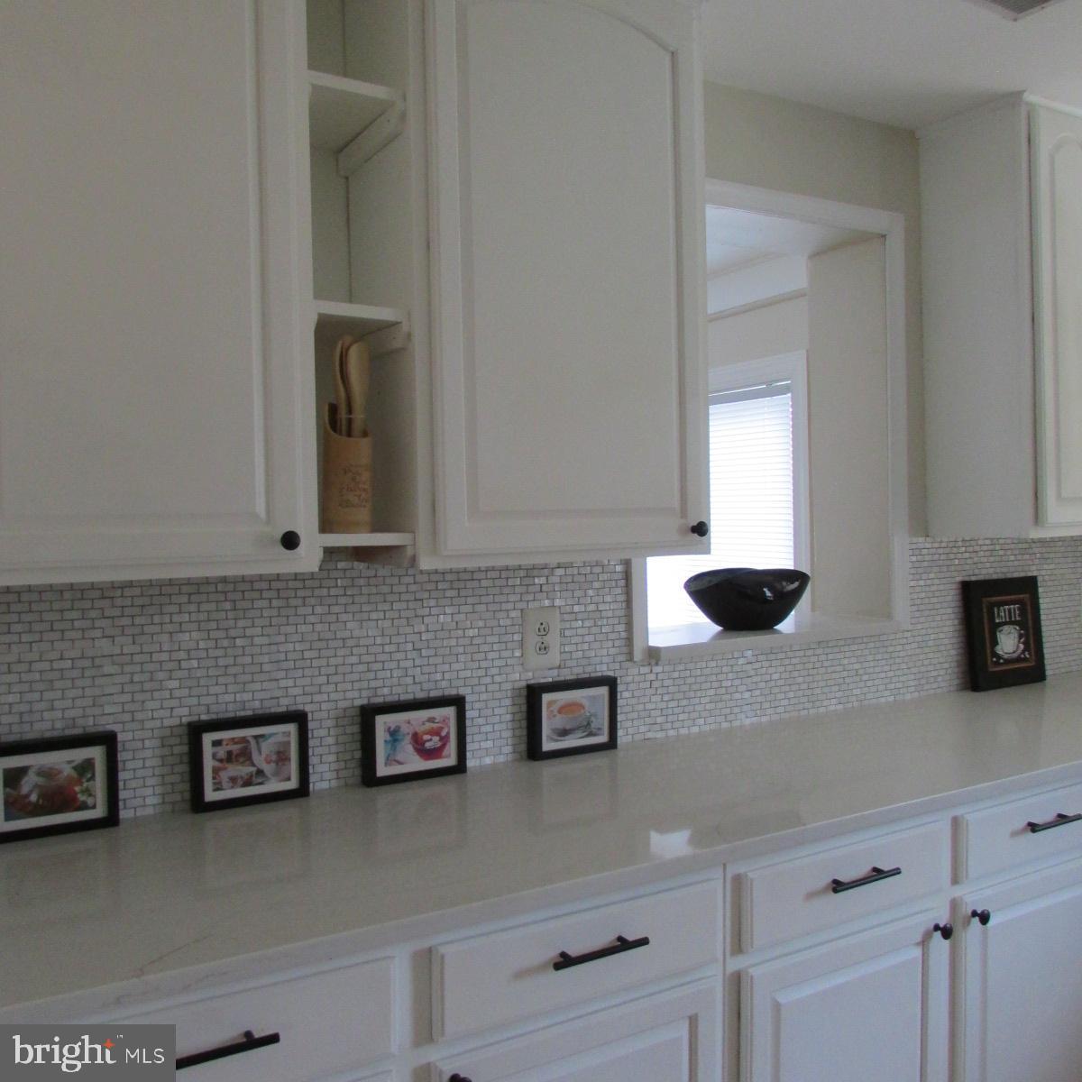 3605 Enterprise Road Bowie, MD 20721 - Photo 13 of 23 a view of cabinets a sink and dishwasher in a kitchen