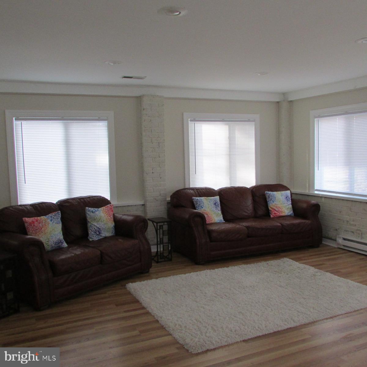 3605 Enterprise Road Bowie, MD 20721 - Photo 14 of 23 a living room with furniture and a couch