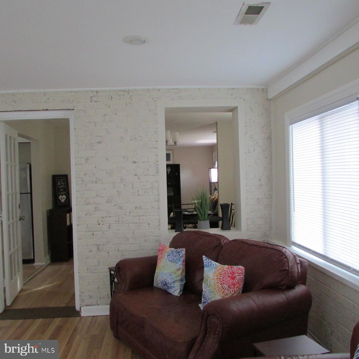 3605 Enterprise Road Bowie, MD 20721 - Photo 16 of 23 a living room with furniture and a window