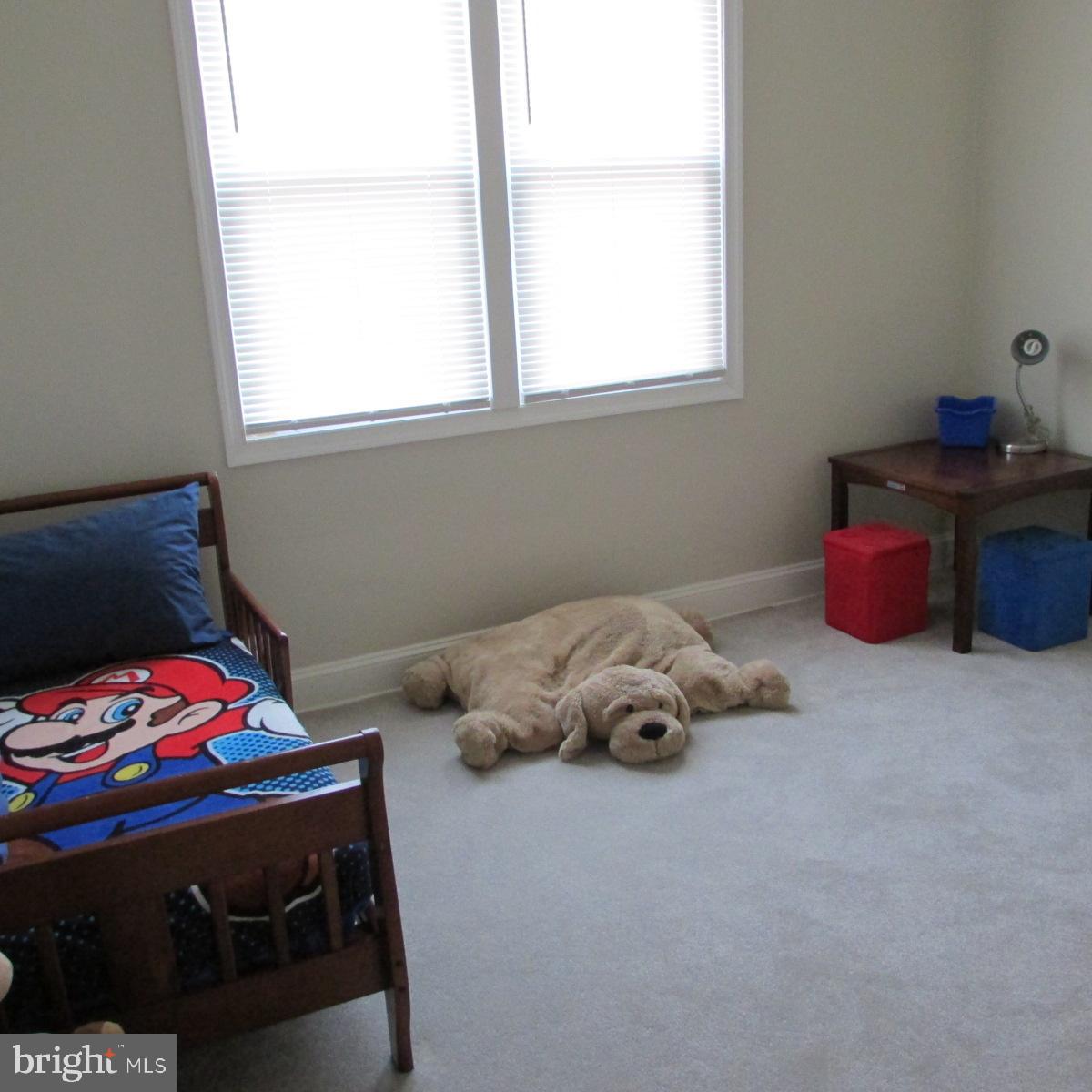 3605 Enterprise Road Bowie, MD 20721 - Photo 22 of 23 a room with a window and bed