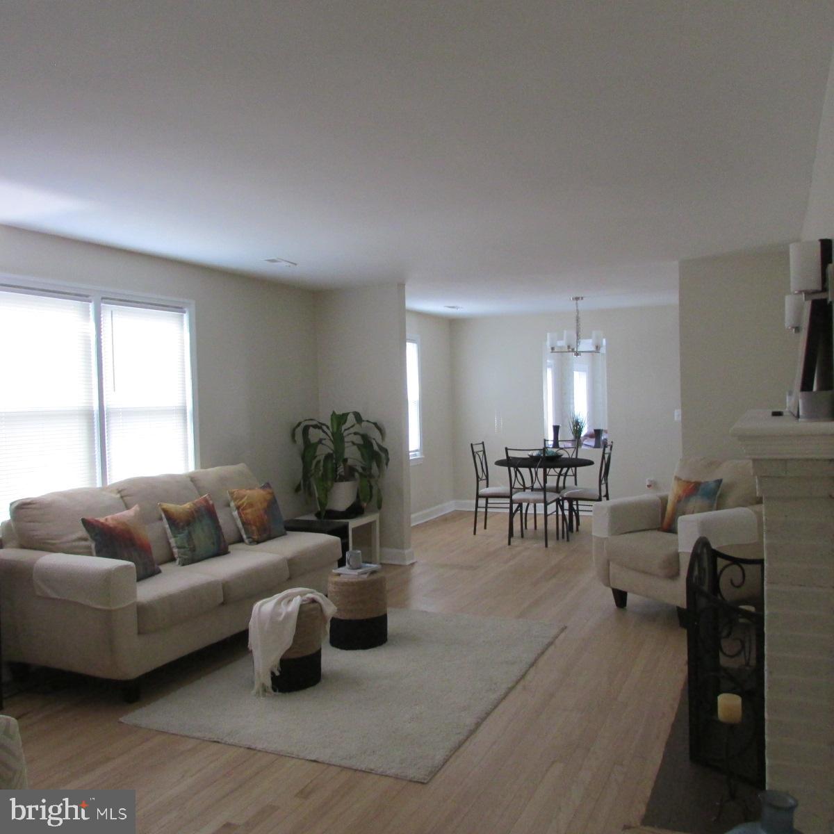 3605 Enterprise Road Bowie, MD 20721 - Photo 3 of 23 a living room with furniture and a couch