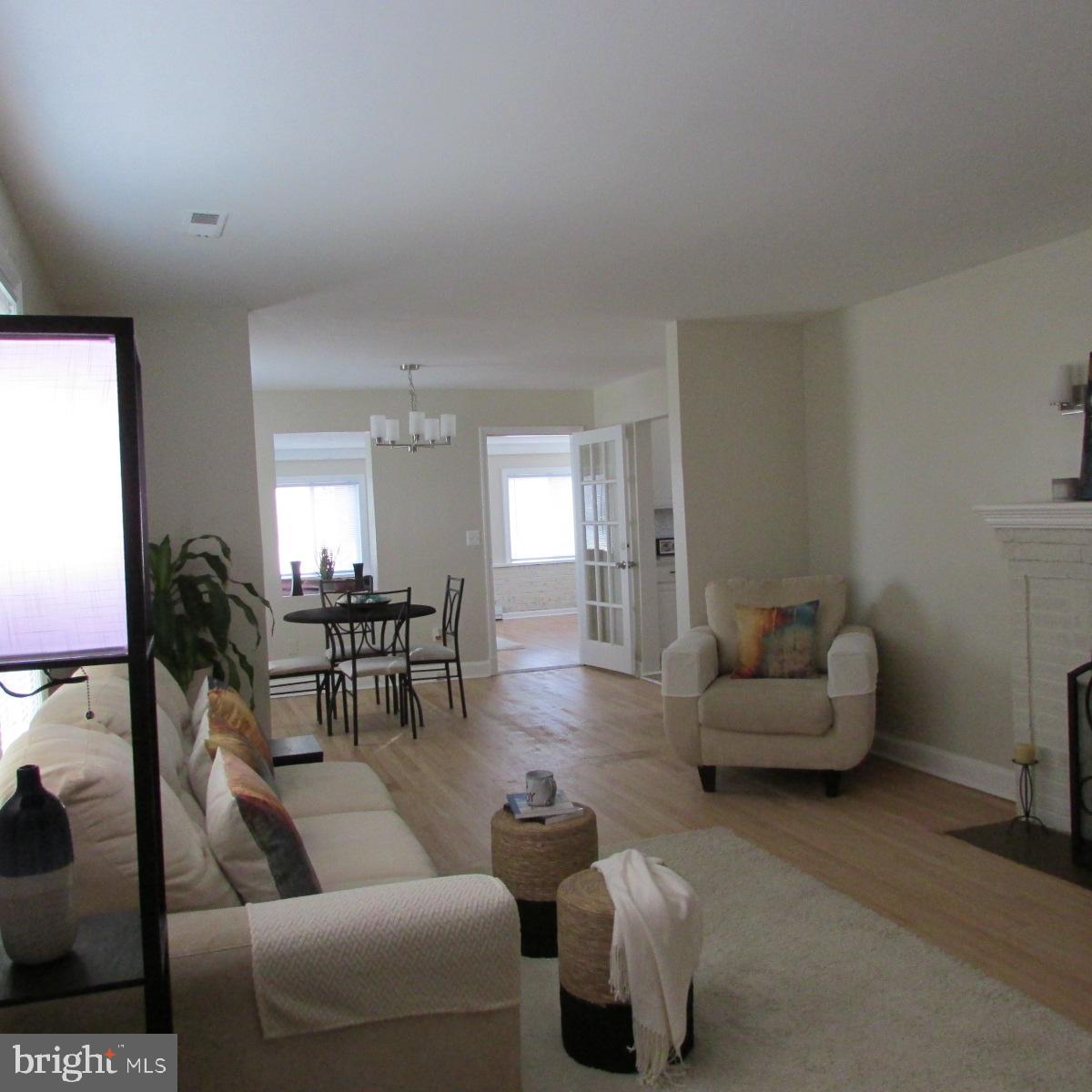 3605 Enterprise Road Bowie, MD 20721 - Photo 5 of 23 a living room with furniture and a couch