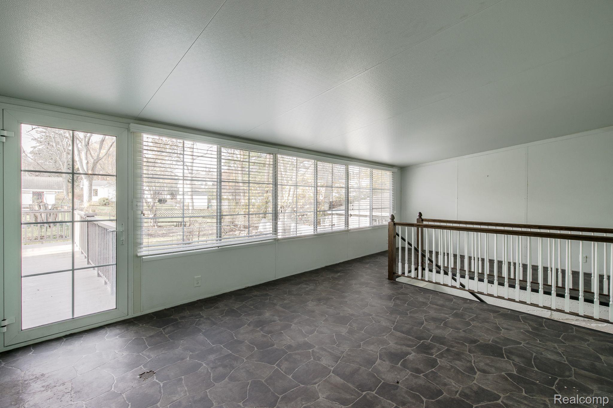 122 Sisson Street Romeo, MI 48065 - Photo 22 of 44 This massive flex room has tons of windows