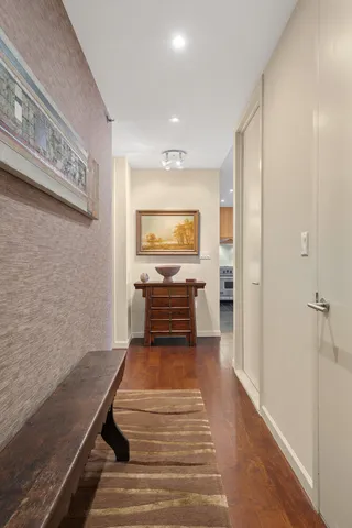 a view of a living room with a fireplace