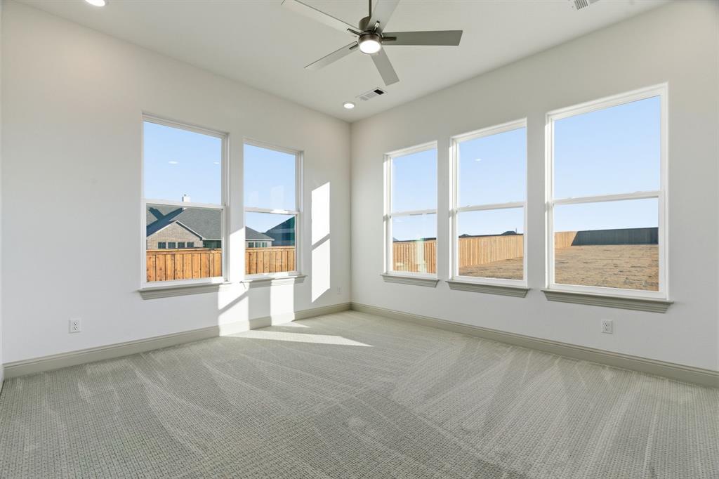 113 Rockford Street Rhome, TX 76078 - Photo 22 of 27 a view of an empty room with a window