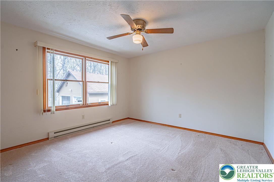 53 Panther Run Road Jim Thorpe, PA 18229 - Photo 32 of 53 an empty room with windows and fan