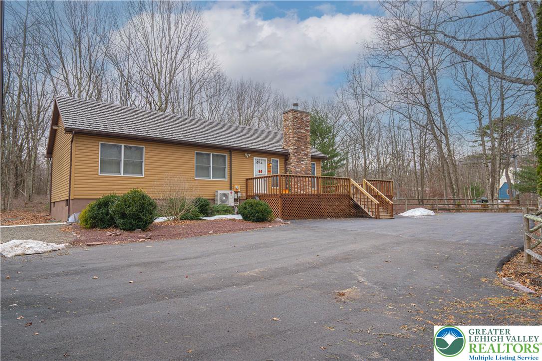 53 Panther Run Road Jim Thorpe, PA 18229 - Photo 4 of 53 a front view of a house with a yard and garage