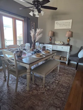 a view of a dining room with furniture