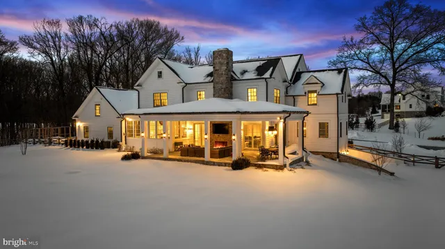 a view of walk in closet with clothes