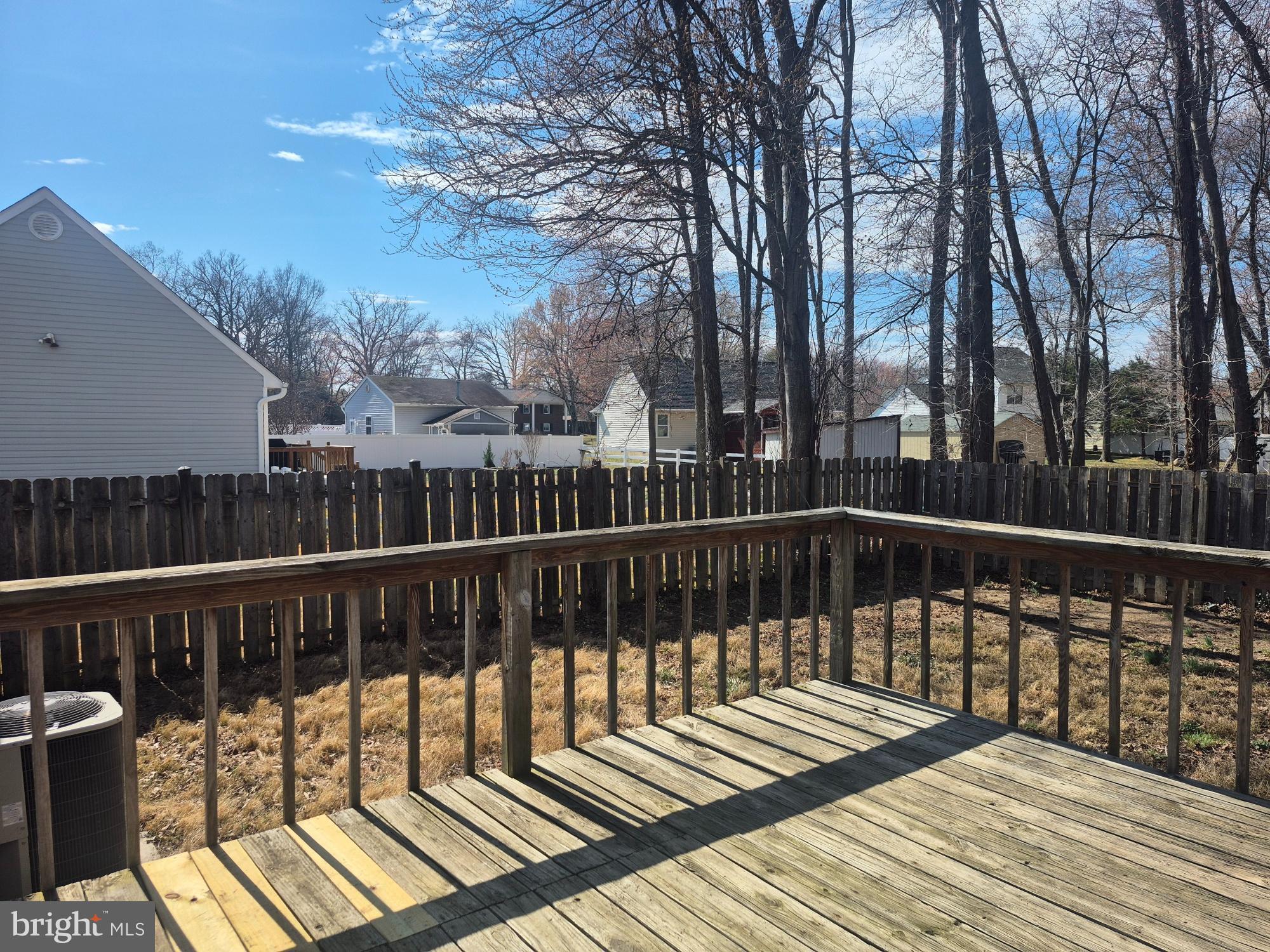 2855 Stavors Road Waldorf, MD 20603 - Photo 27 of 33 Sunny deck with serene backyard views.