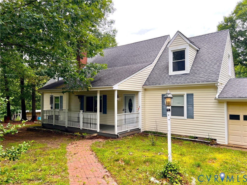 2049 Riddle Road Blackstone, VA 23824 - Photo 1 of 41 a view of a house with a yard