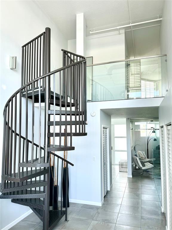 1490 Southeast 15th Street, Unit 202 Fort Lauderdale, FL 33316 - Photo 13 of 31 a view of entryway and hall with dining room