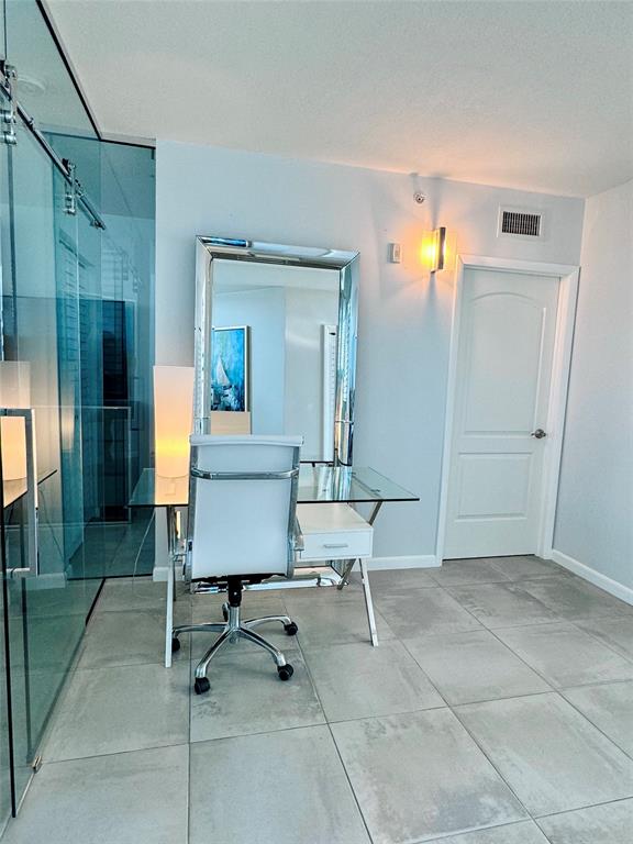 1490 Southeast 15th Street, Unit 202 Fort Lauderdale, FL 33316 - Photo 15 of 31 a view of a livingroom with furniture and a window
