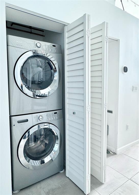 1490 Southeast 15th Street, Unit 202 Fort Lauderdale, FL 33316 - Photo 16 of 31 a utility room with dryer and washer