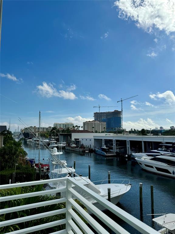 1490 Southeast 15th Street, Unit 202 Fort Lauderdale, FL 33316 - Photo 18 of 31 a view of a swimming pool and lounge chair
