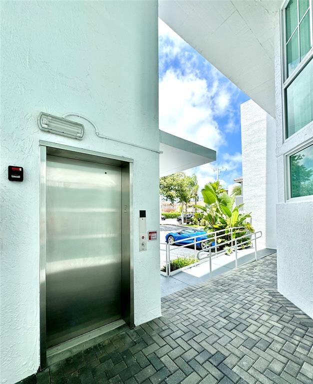 1490 Southeast 15th Street, Unit 202 Fort Lauderdale, FL 33316 - Photo 24 of 31 a view of kitchen with furniture and refrigerator