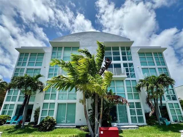 a view of a backyard with a patio