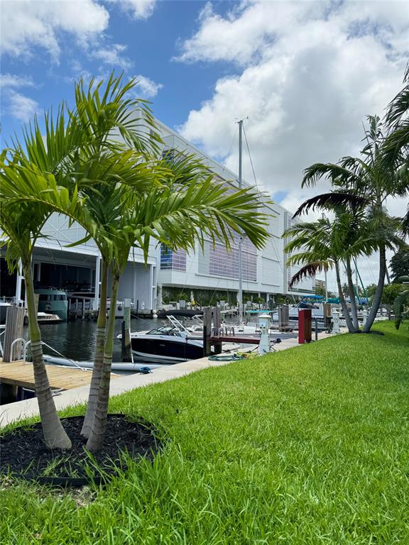 1490 Southeast 15th Street, Unit 202 Fort Lauderdale, FL 33316 - Photo 28 of 31 a view of a backyard with a patio