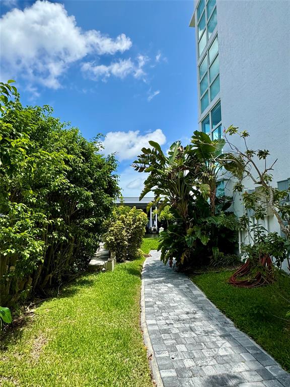 1490 Southeast 15th Street, Unit 202 Fort Lauderdale, FL 33316 - Photo 29 of 31 a view of a garden
