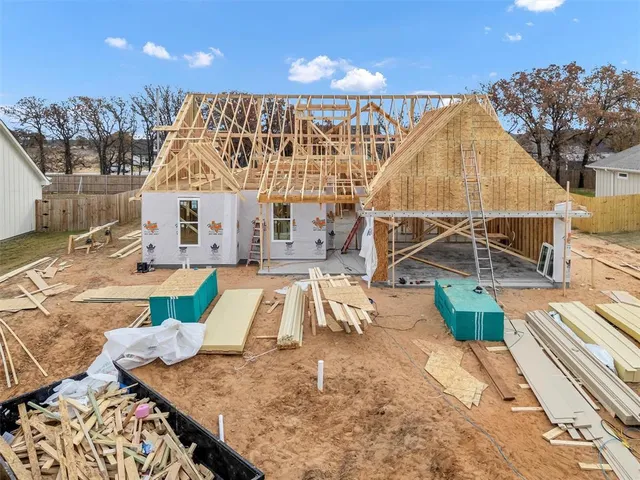 a view of a house with a swimming pool
