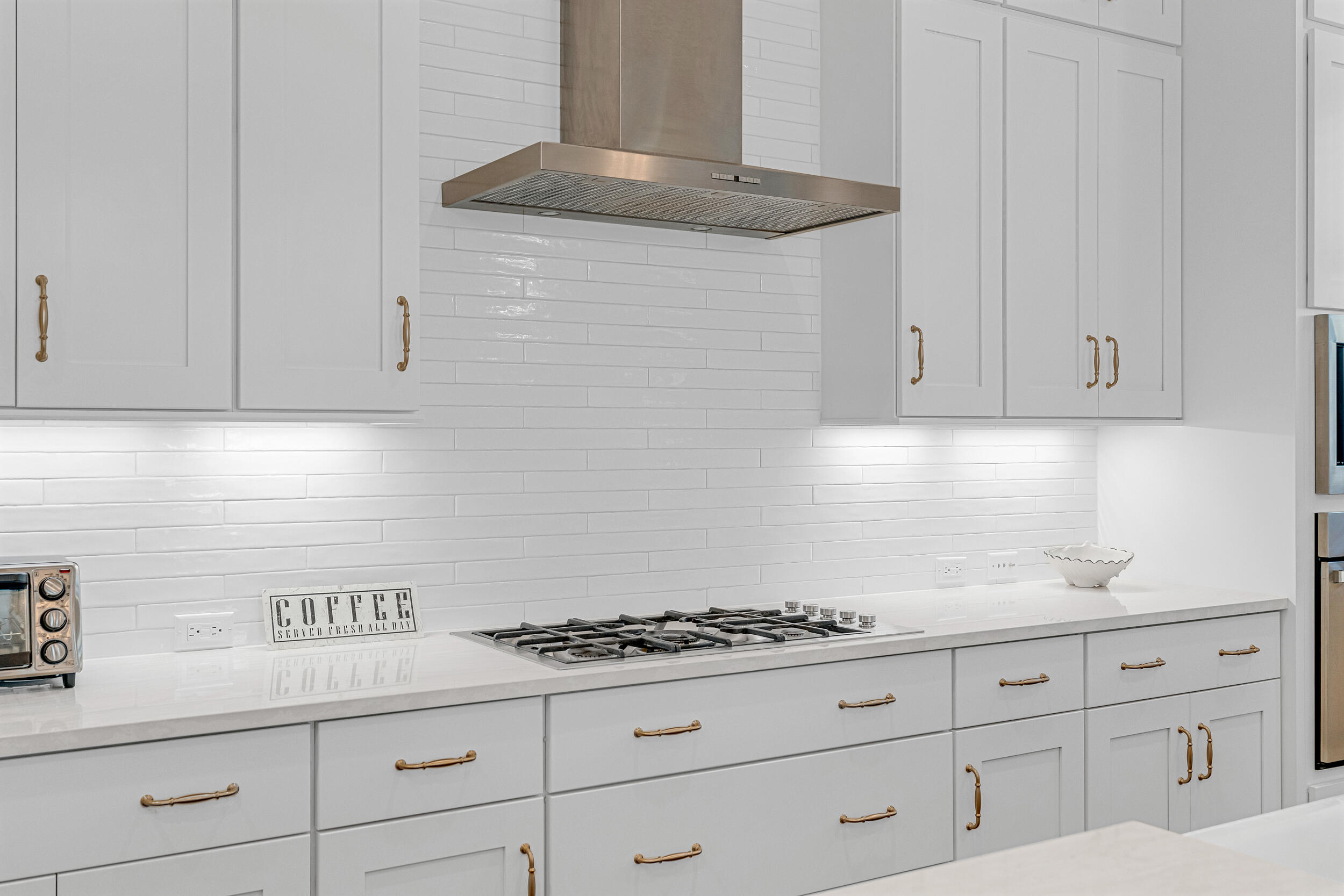 68 Ridgewalk Circle Santa Rosa Beach, FL 32459 - Photo 16 of 58 a kitchen with white cabinets and appliances