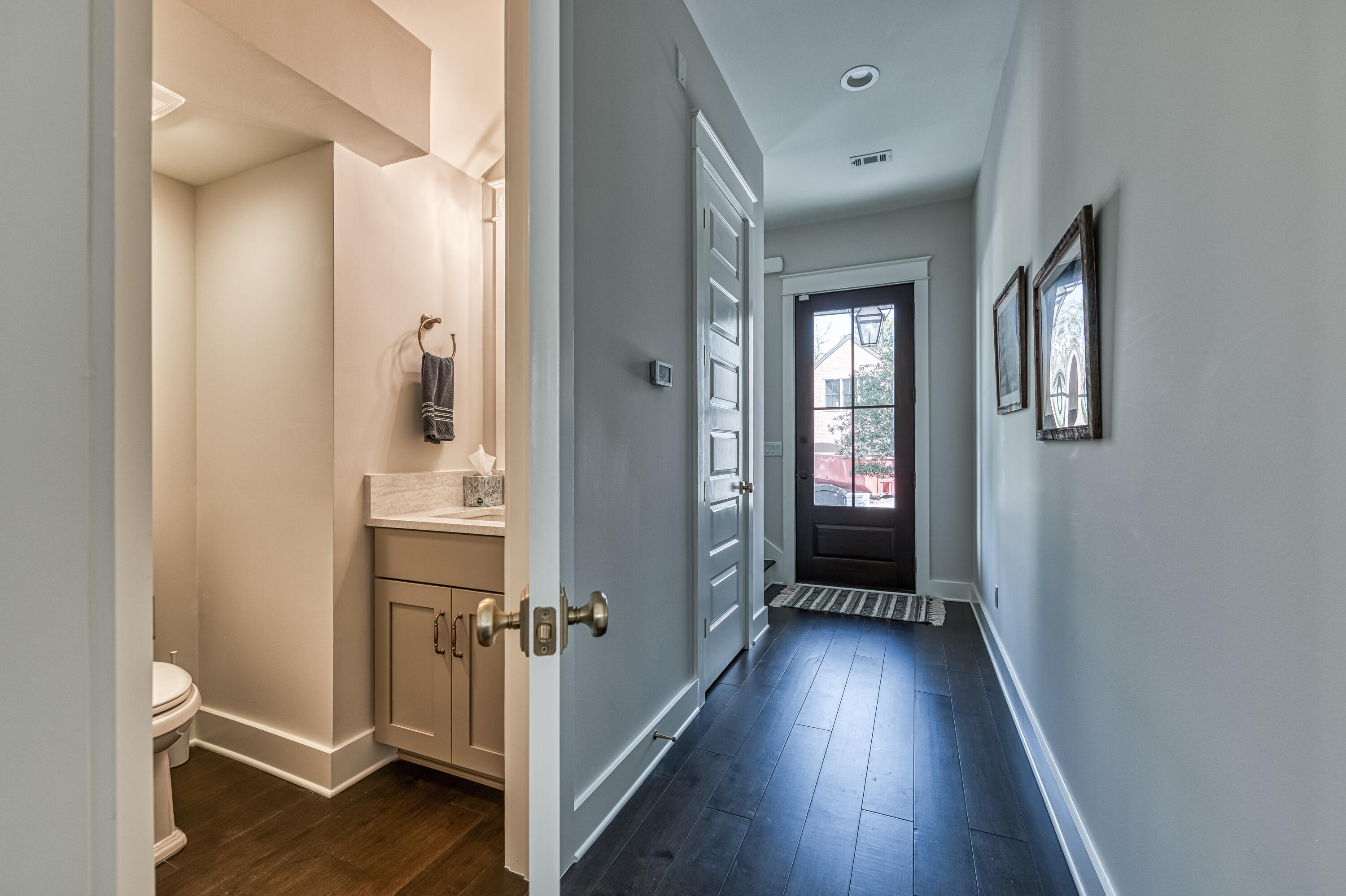 68 Ridgewalk Circle Santa Rosa Beach, FL 32459 - Photo 27 of 58 a view of a hallway with wooden floor and closet