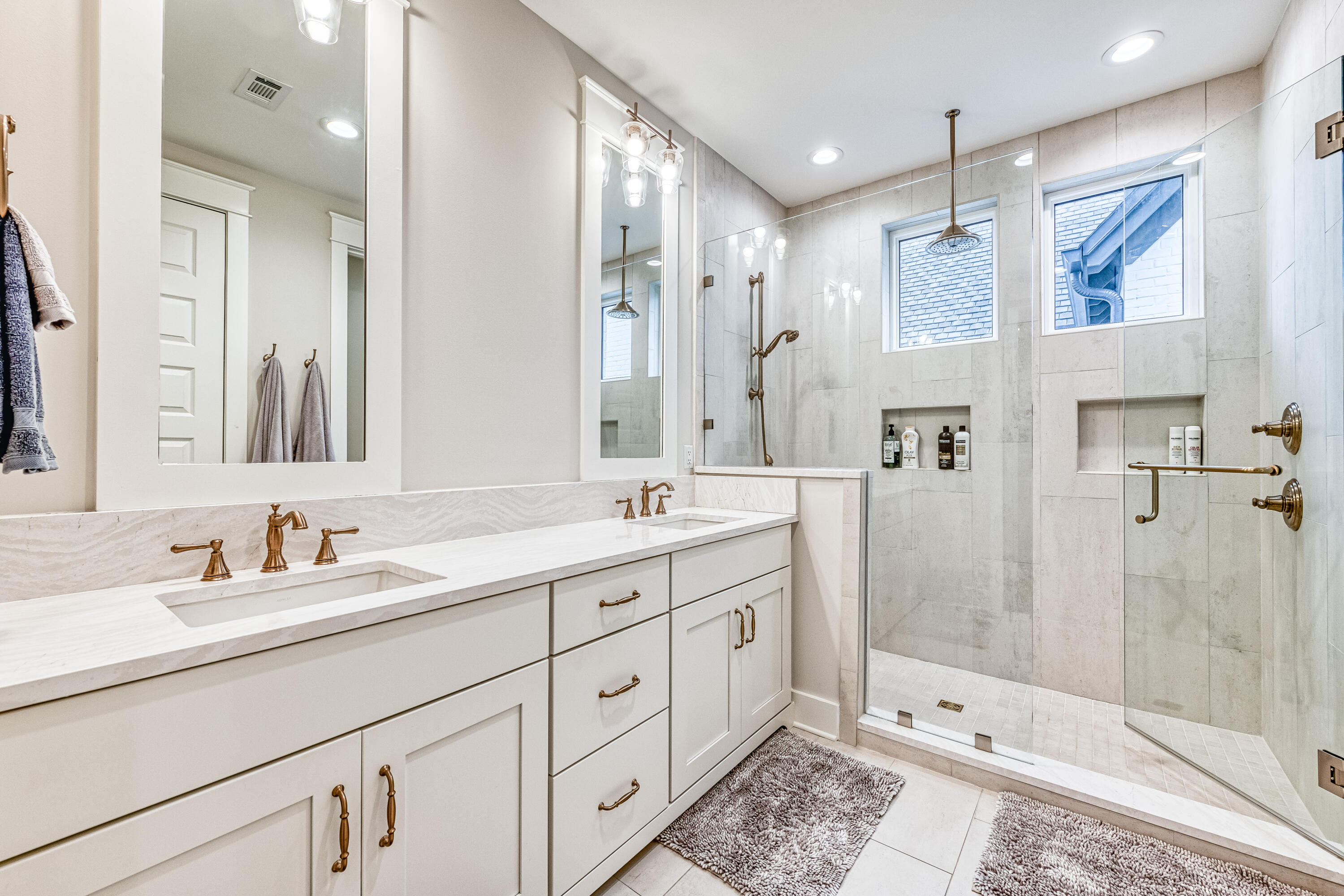 68 Ridgewalk Circle Santa Rosa Beach, FL 32459 - Photo 39 of 58 a bathroom with a double vanity sink mirror double shower and a bathtub