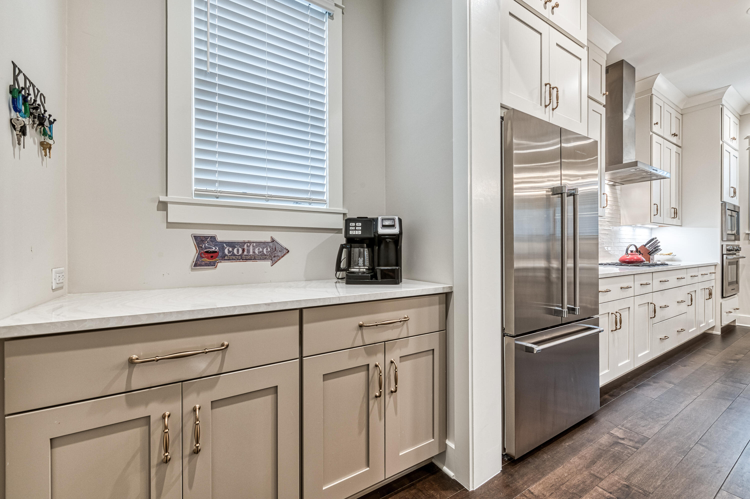 68 Ridgewalk Circle Santa Rosa Beach, FL 32459 - Photo 9 of 58 a kitchen with stainless steel appliances cabinets and a window
