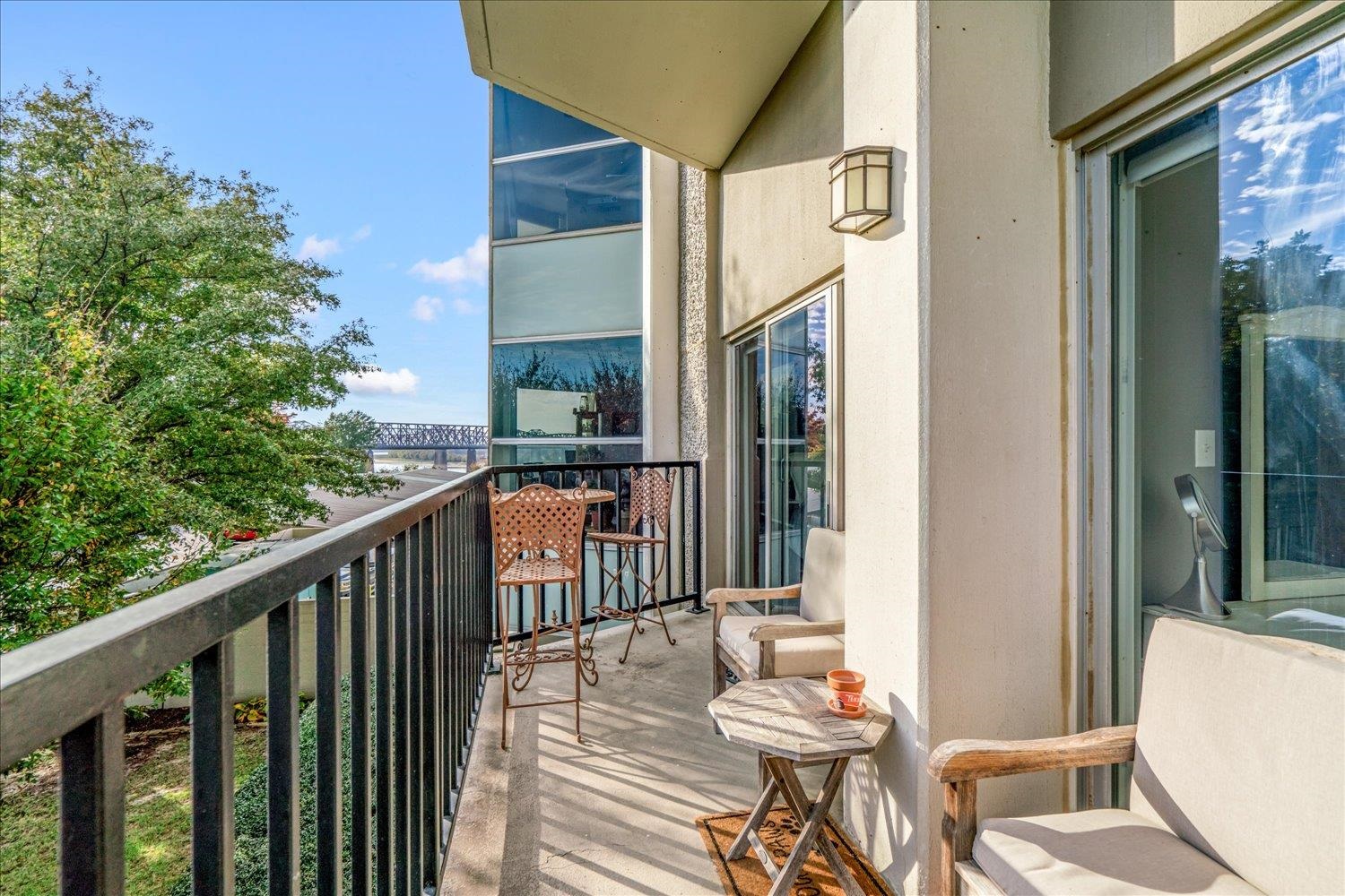 655 Riverside Drive, Unit 202 Memphis, TN 38103 - Photo 25 of 37 a balcony view with a seating space