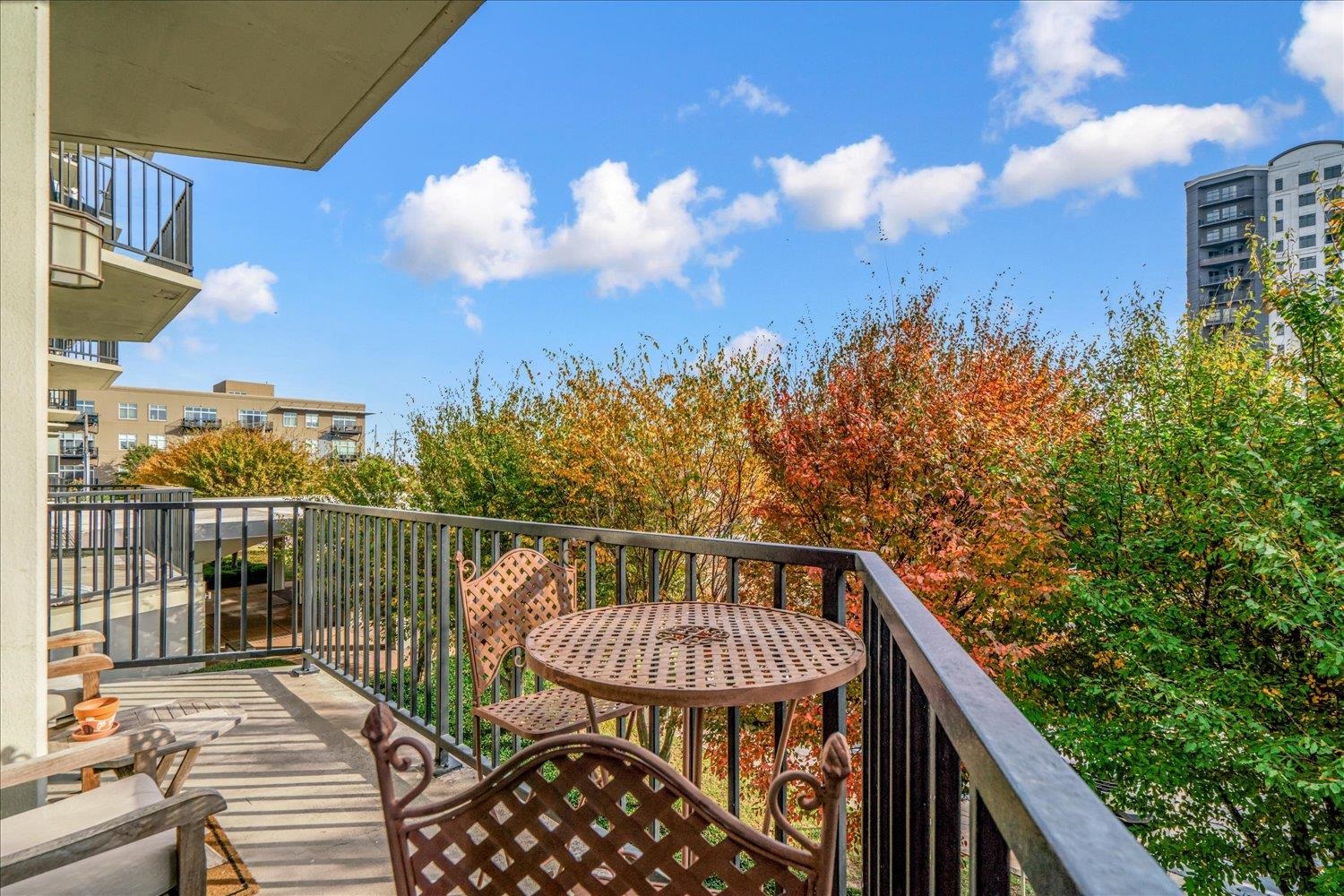 655 Riverside Drive, Unit 202 Memphis, TN 38103 - Photo 26 of 37 a view of a balcony with two chairs