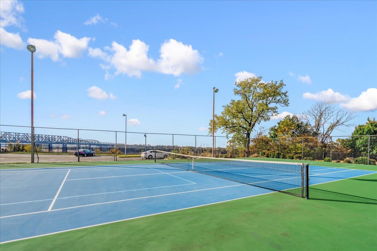 655 Riverside Drive, Unit 202 Memphis, TN 38103 - Photo 32 of 37 a view of a tennis court